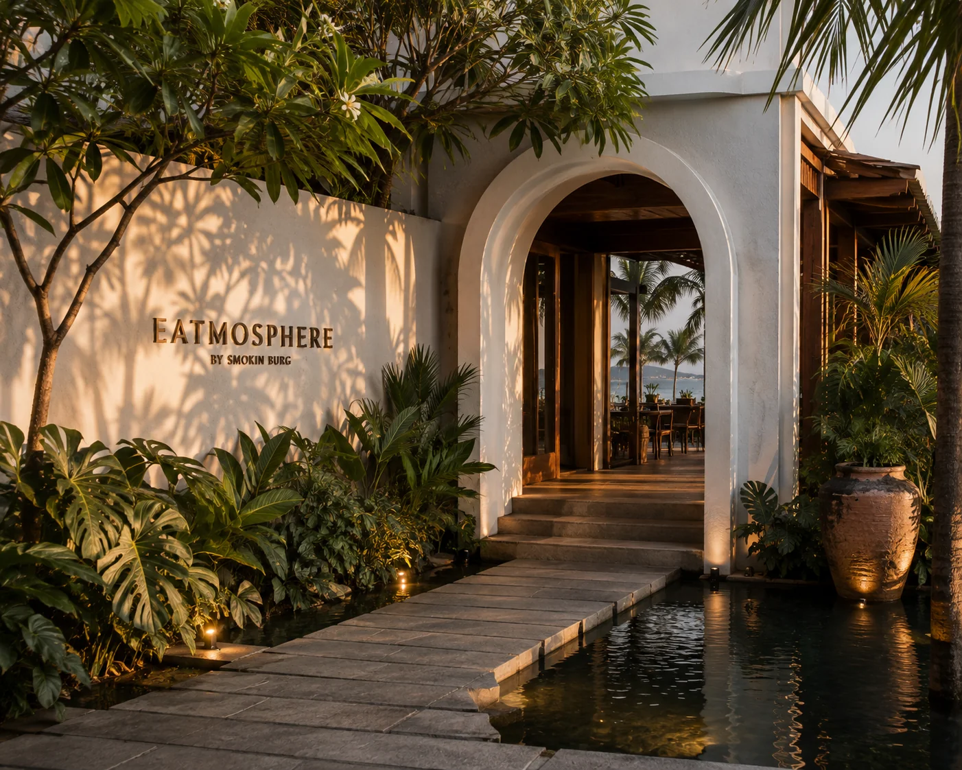 The entrance arch and water feature