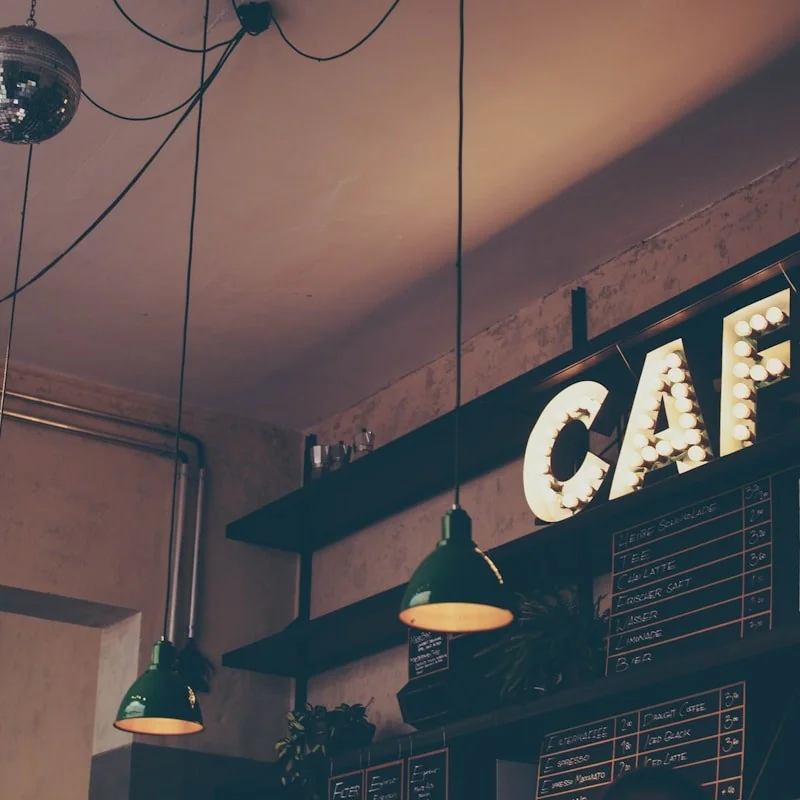 Barista pouring espresso latte art