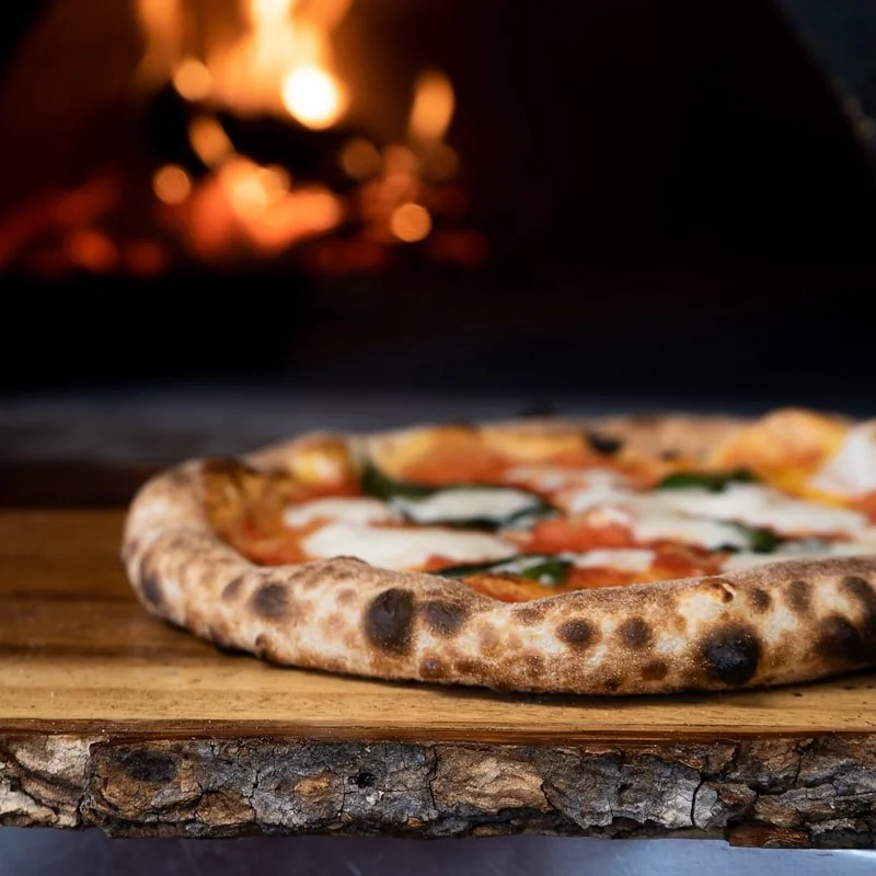Wood-fired oven pizza pull