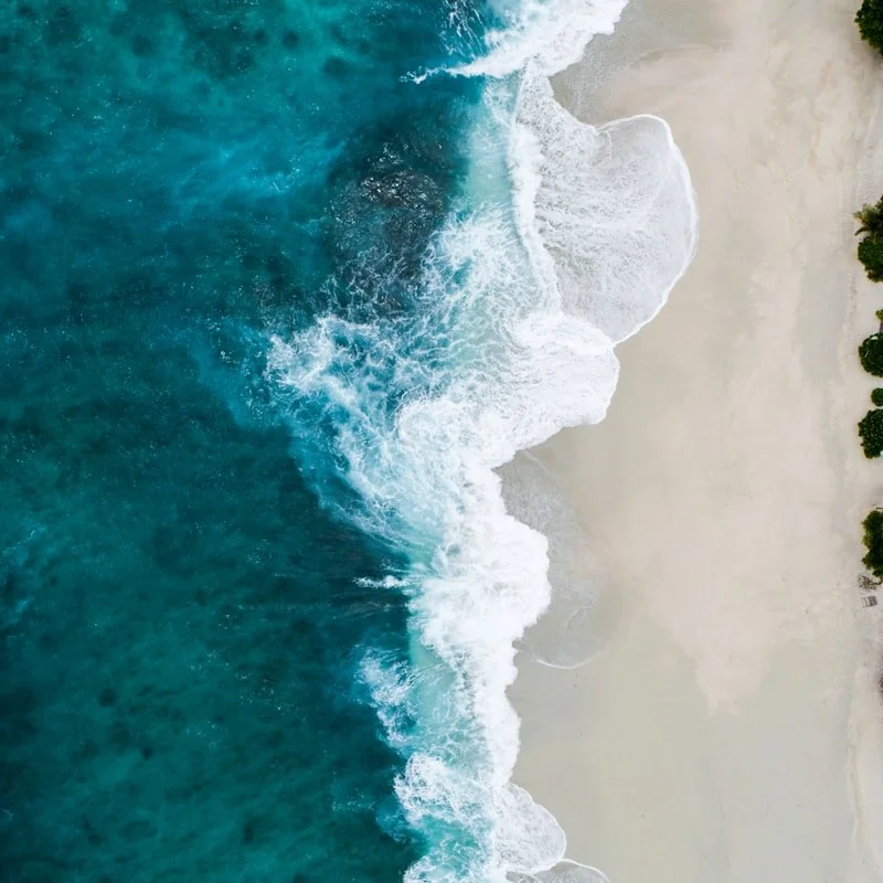 Ocean waves against terrace railing